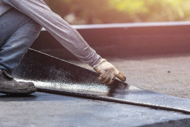 Professional Waterproofing technician working in Oakton, VA